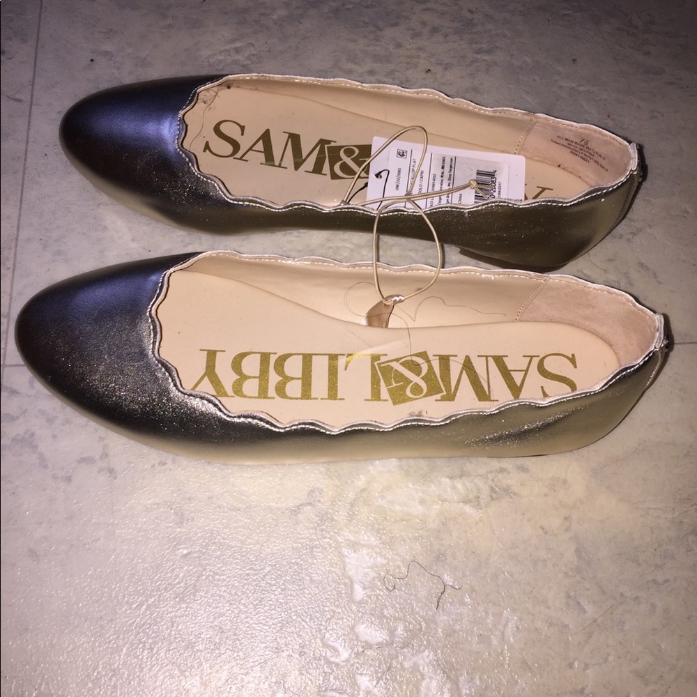 Brand new gold flats. Never worn